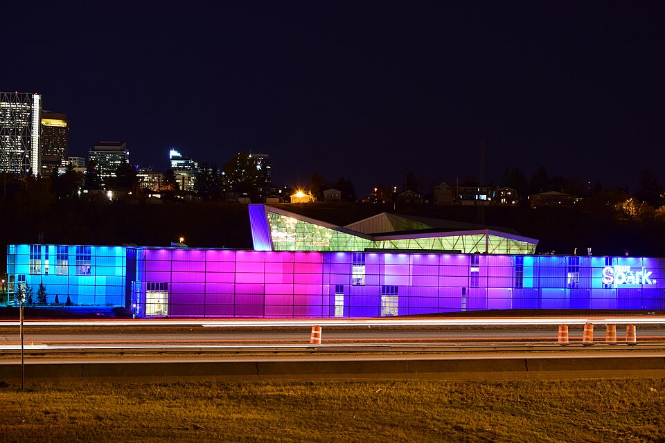 TELUS Spark Science Centre glowing at night in Calgary