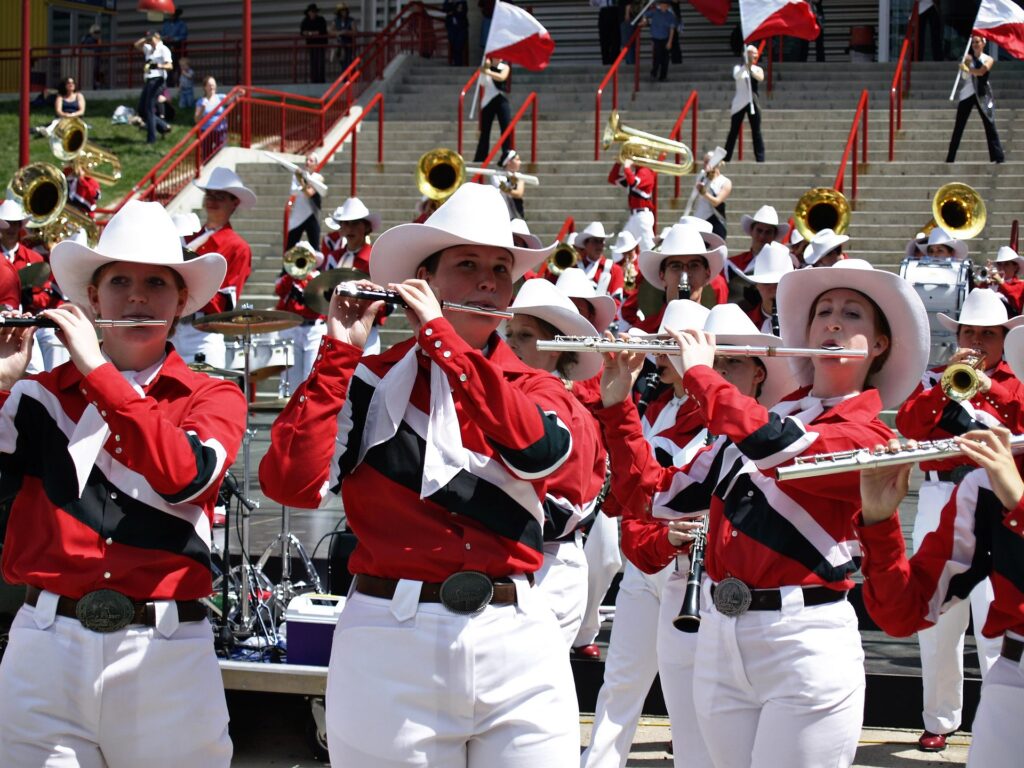 Marching band performing in uniform at the Calgary Stampede parade