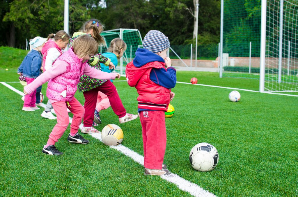 Kids playing soccer for a birthday party creative idea Calgary Photo by Lukas