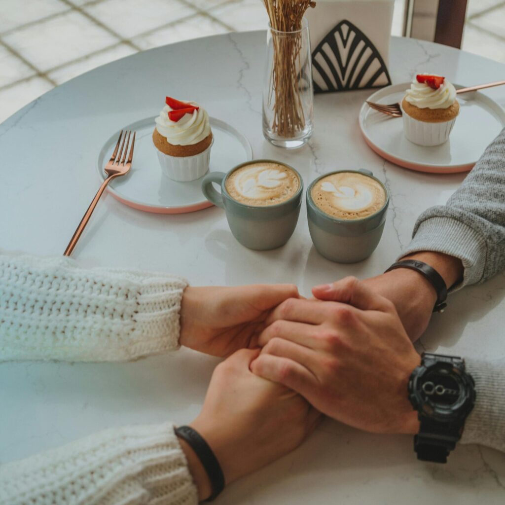 Couples having a date at coffee shop, one of the best indoor date ideas in Calgary 2025