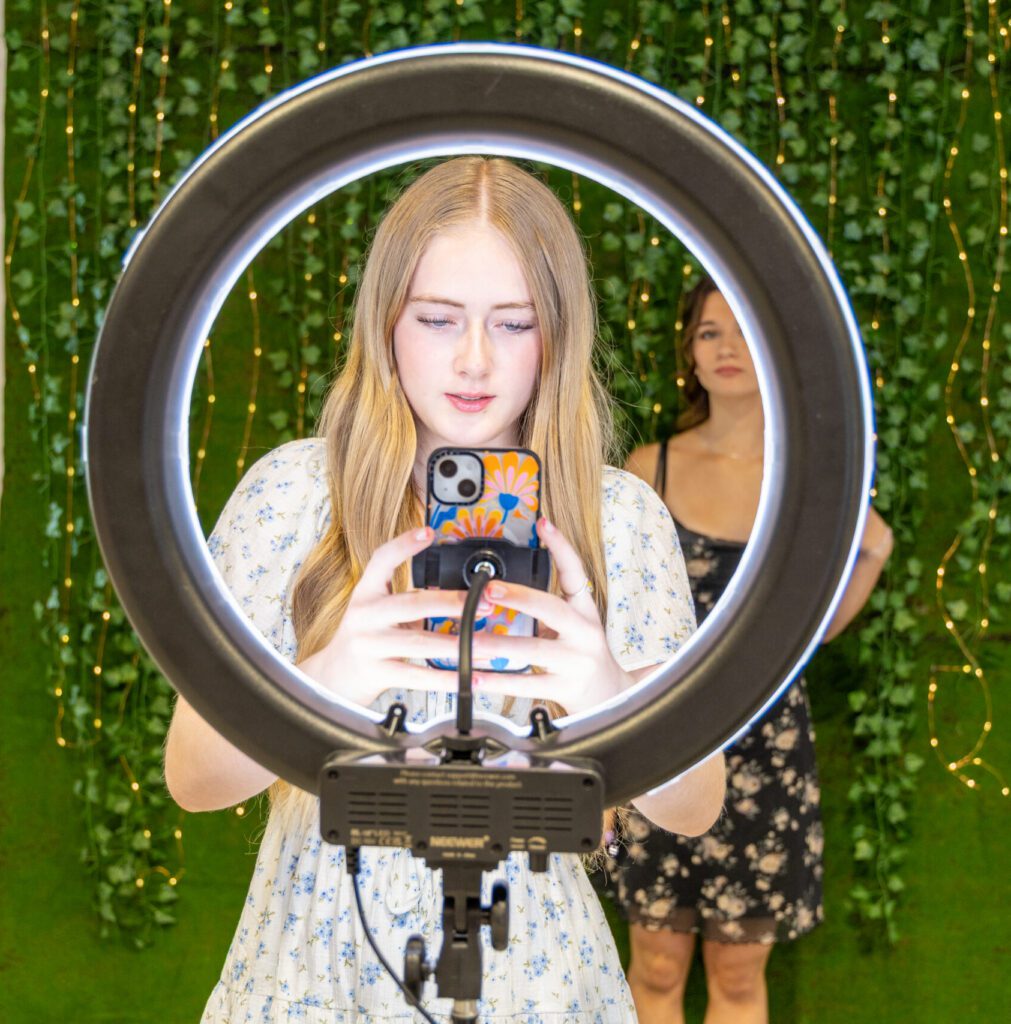 two girls posing at Calgary Selfie Museum at a birthday party
