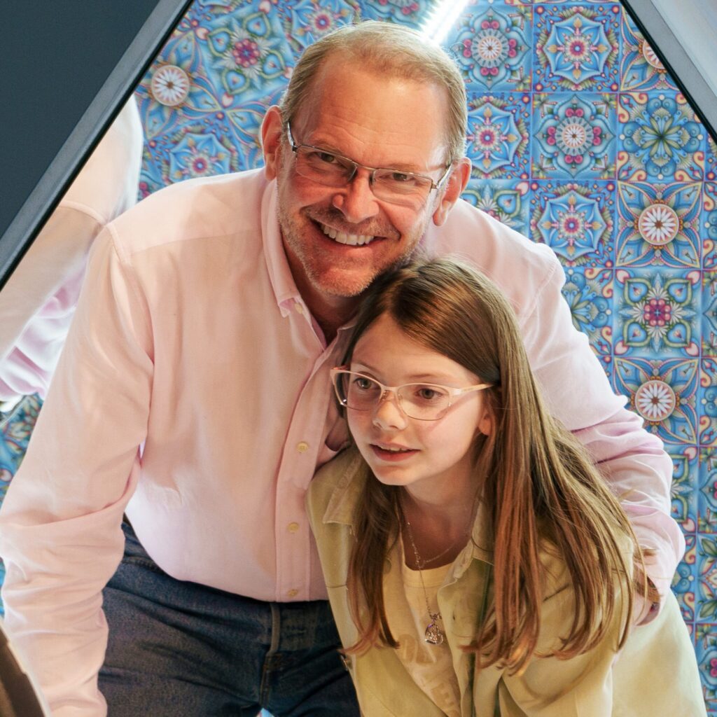 parent taking photo at kids birthday party at Calgary Selfie Museum